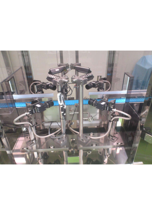 写真（樹脂製品外観検査装置）